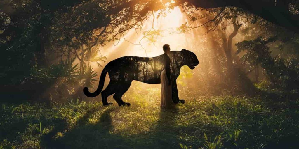 Person in forest with shadow transforming into black jaguar shape