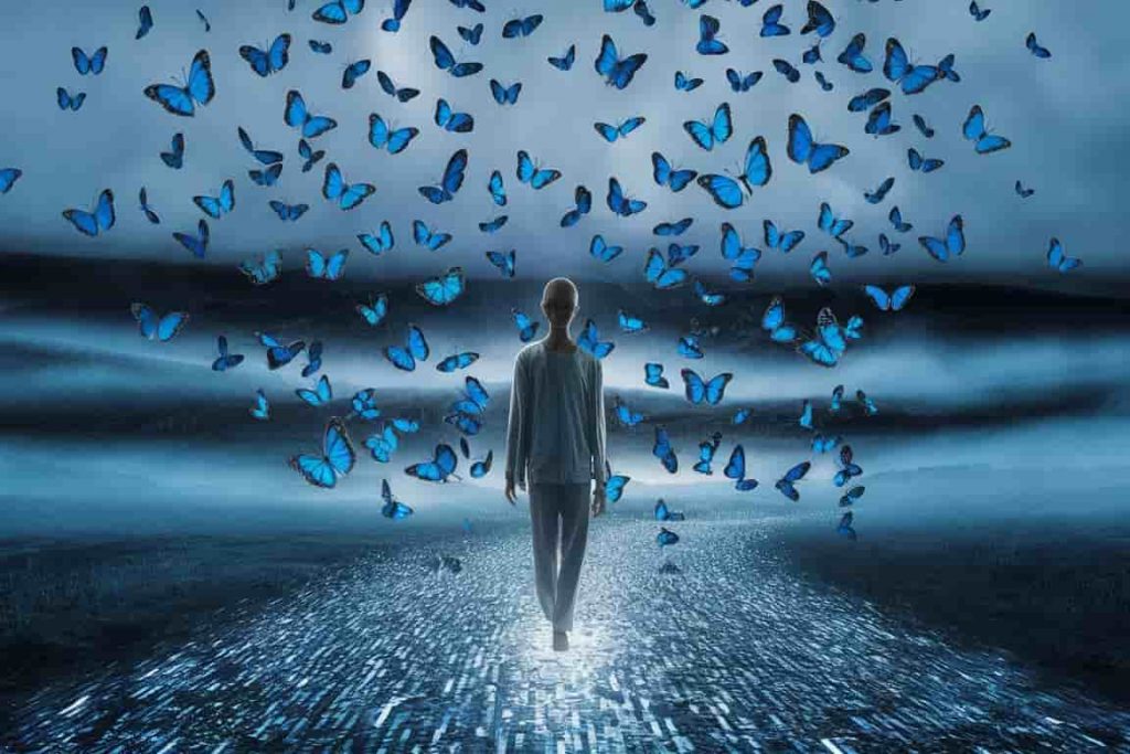 Dreamlike scene with person on blue light path surrounded by blue butterflies and misty landscape