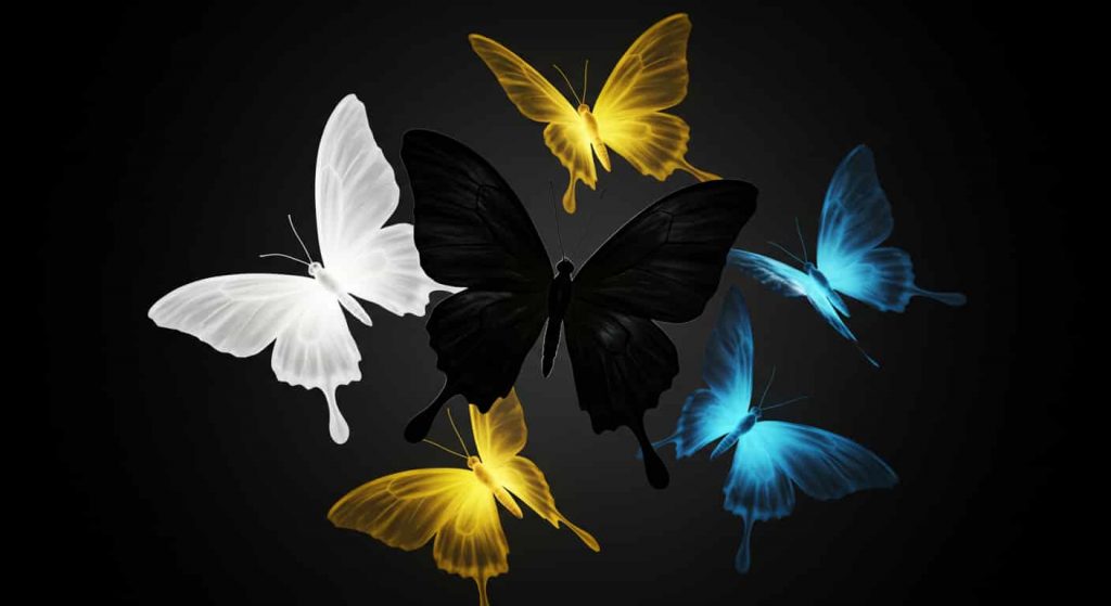 An image comparing a black butterfly to white, yellow, and blue butterflies, each emitting symbolic auras representing their meanings.