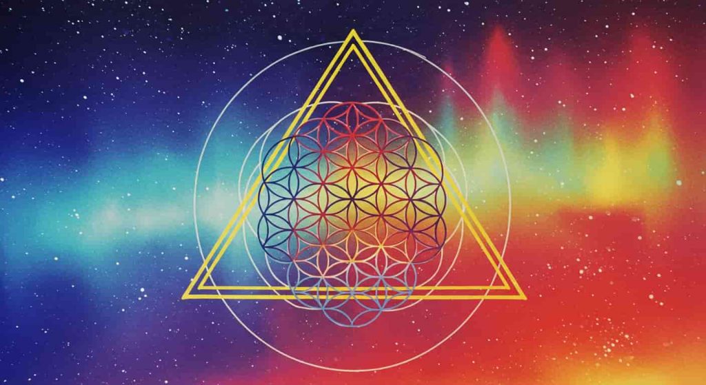 A vibrant pop art style image, featuring a bold Flower of Life pattern with a prominent triangle and circle at its center. The psychedelic color palette, stars, and aurora effects represent the connection between the symbol and sacred geometry.